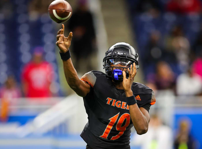 Underwood throwing a pass in the 2022 MHSAA Division 1 state title win over Caledonia. Photo by Mariusz Nowak
